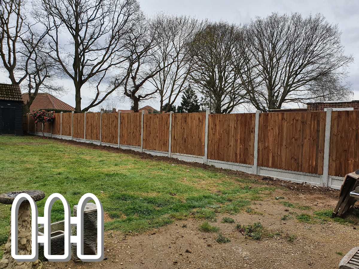 Durable wooden fence spanning the backyard of a suburban garden, enhancing privacy and security